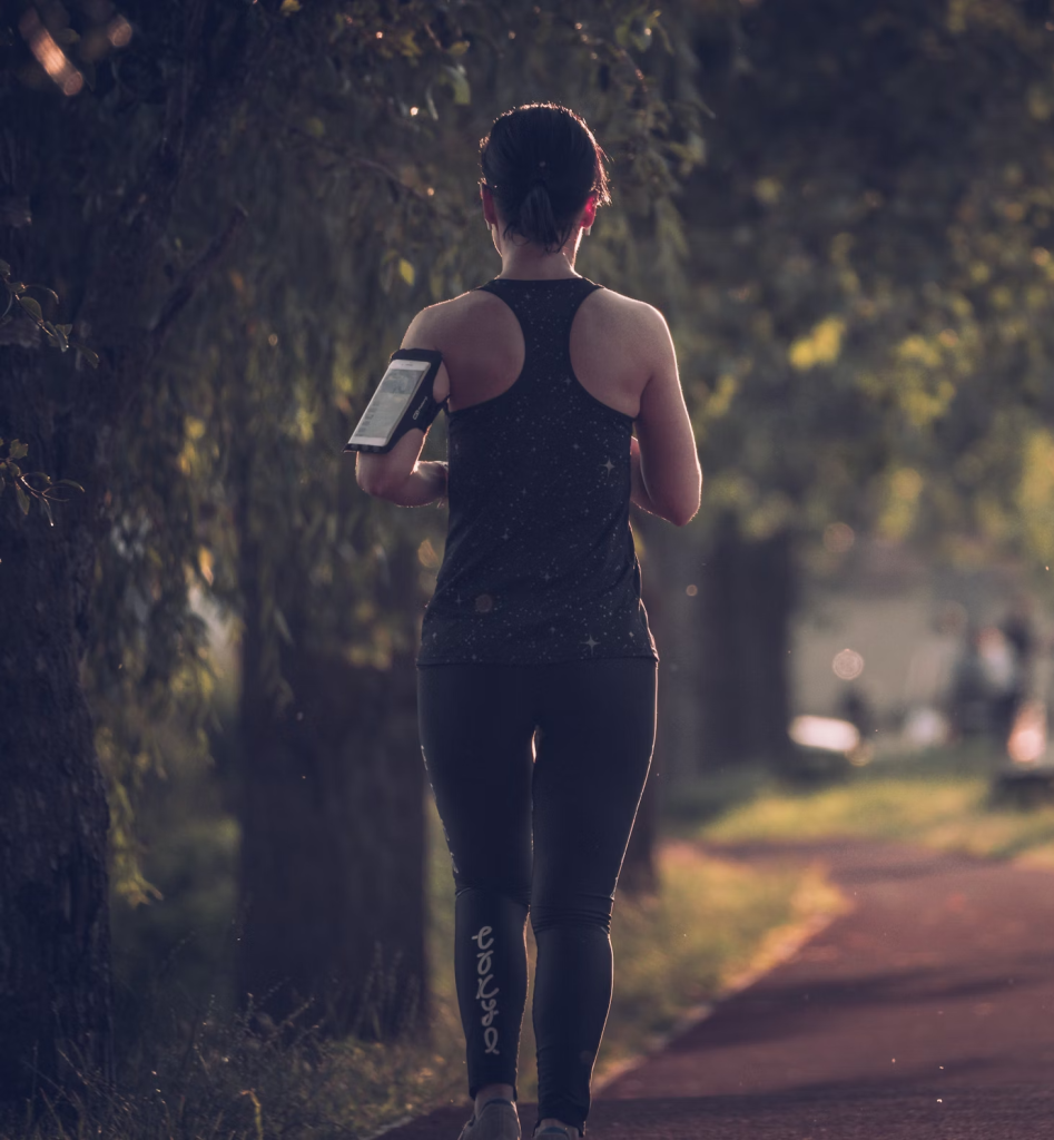 Young woman jogging in city
